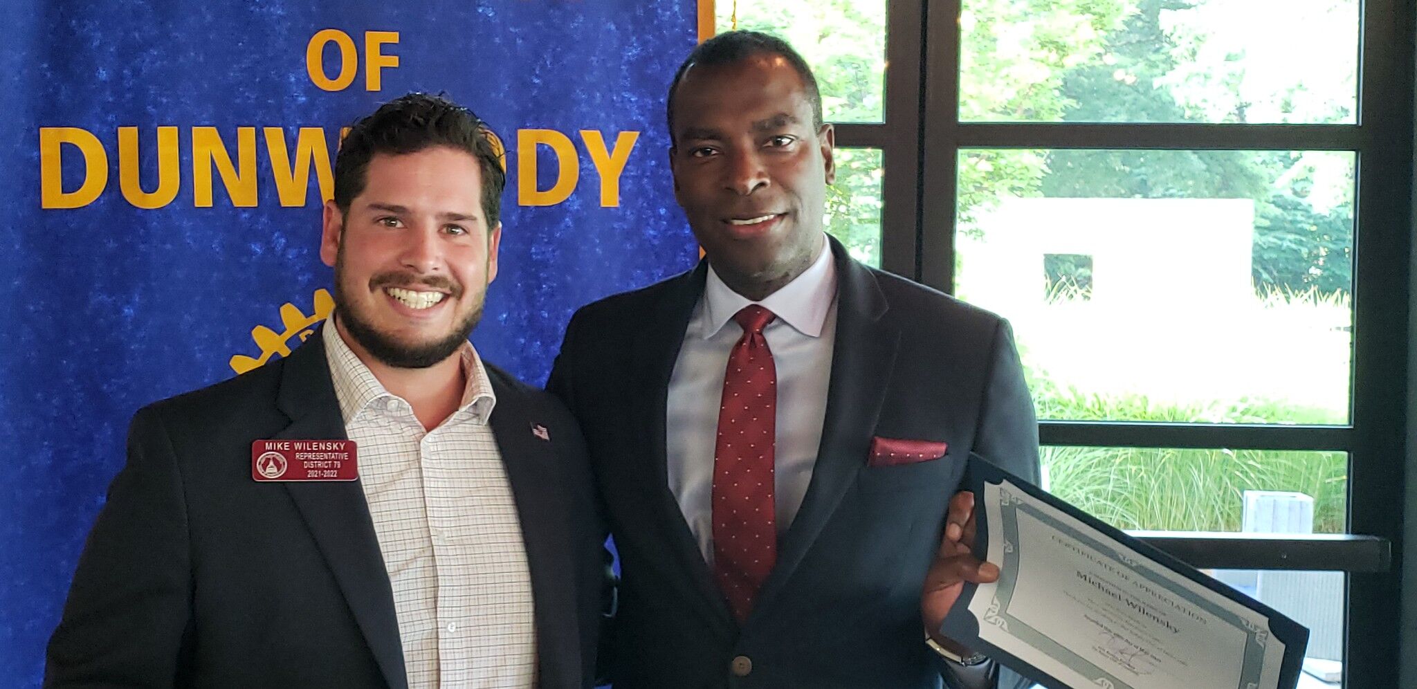 Rep. Mike Wilensky stands with Ardy Bastien, president of Dunwoody Rotary Club.